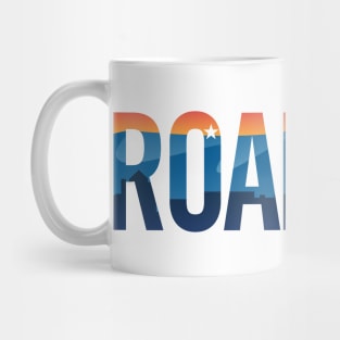 Roanoke pride illustration with mountains, star, city scape and sunset Mug